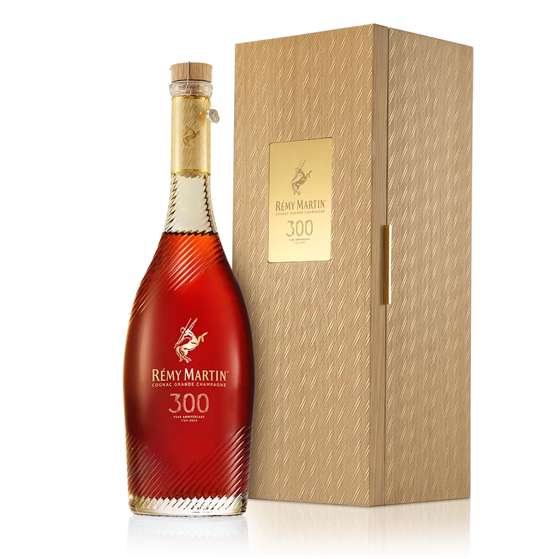Remy Martin cognac bottle with wooden box on a white background